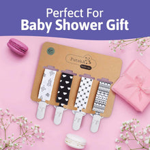 a couple of cell phones sitting on a pink table