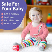 a little girl that is sitting on a snow covered ground