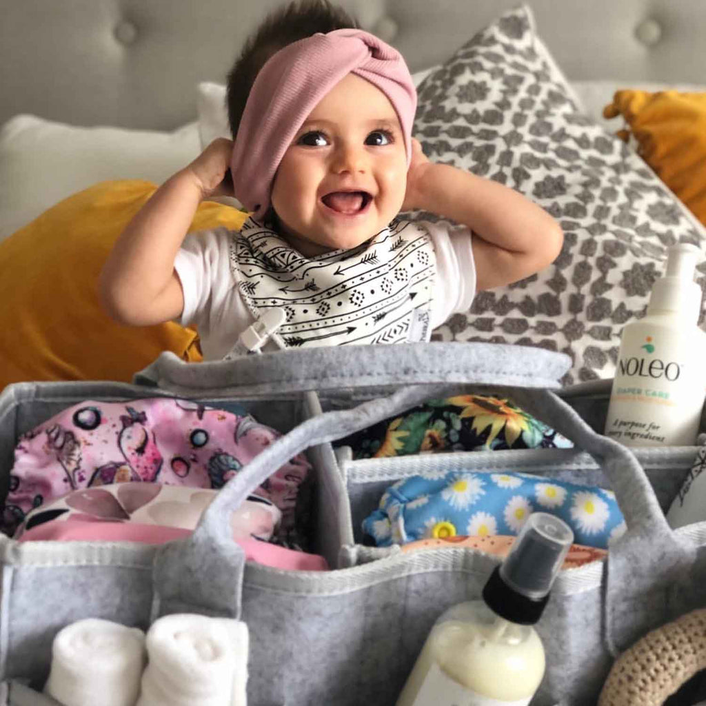 Putska Baby Gift Basket Includes a Diaper caddy, pacifier clips, bibs